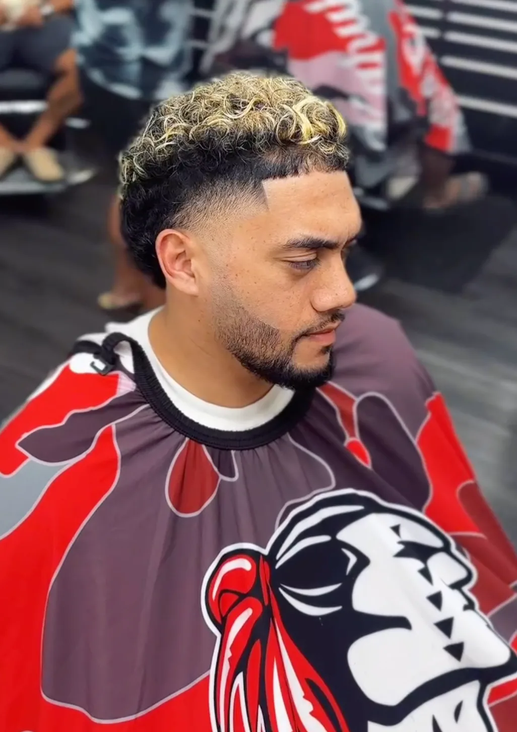 Full beard paired with a clean fade