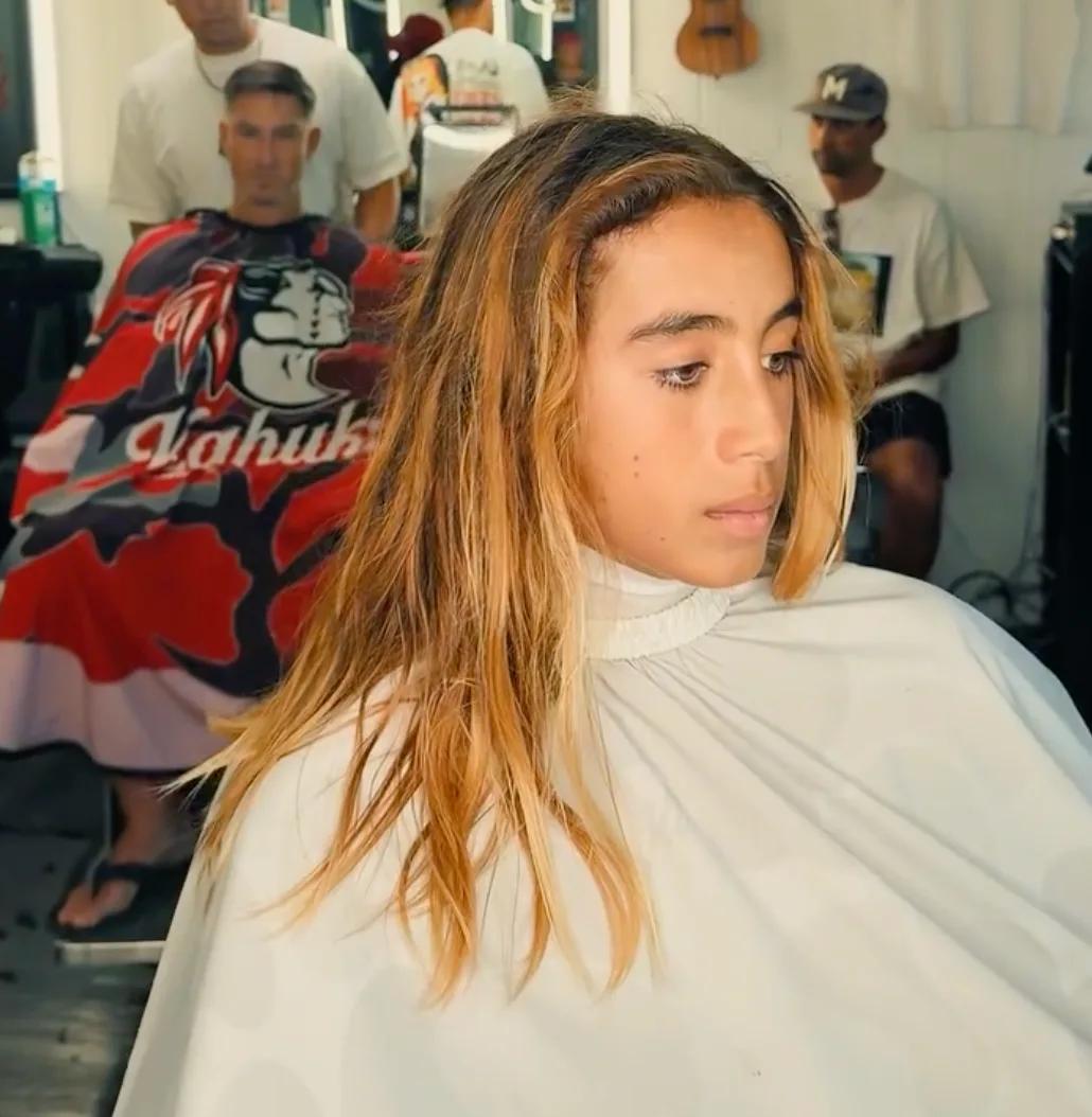 Long hair to clean textured cut transformation at The HI Fade Barbershop — before